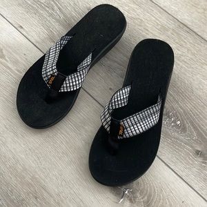 Teva black and white wedge flip flops size 7 NEW never worn